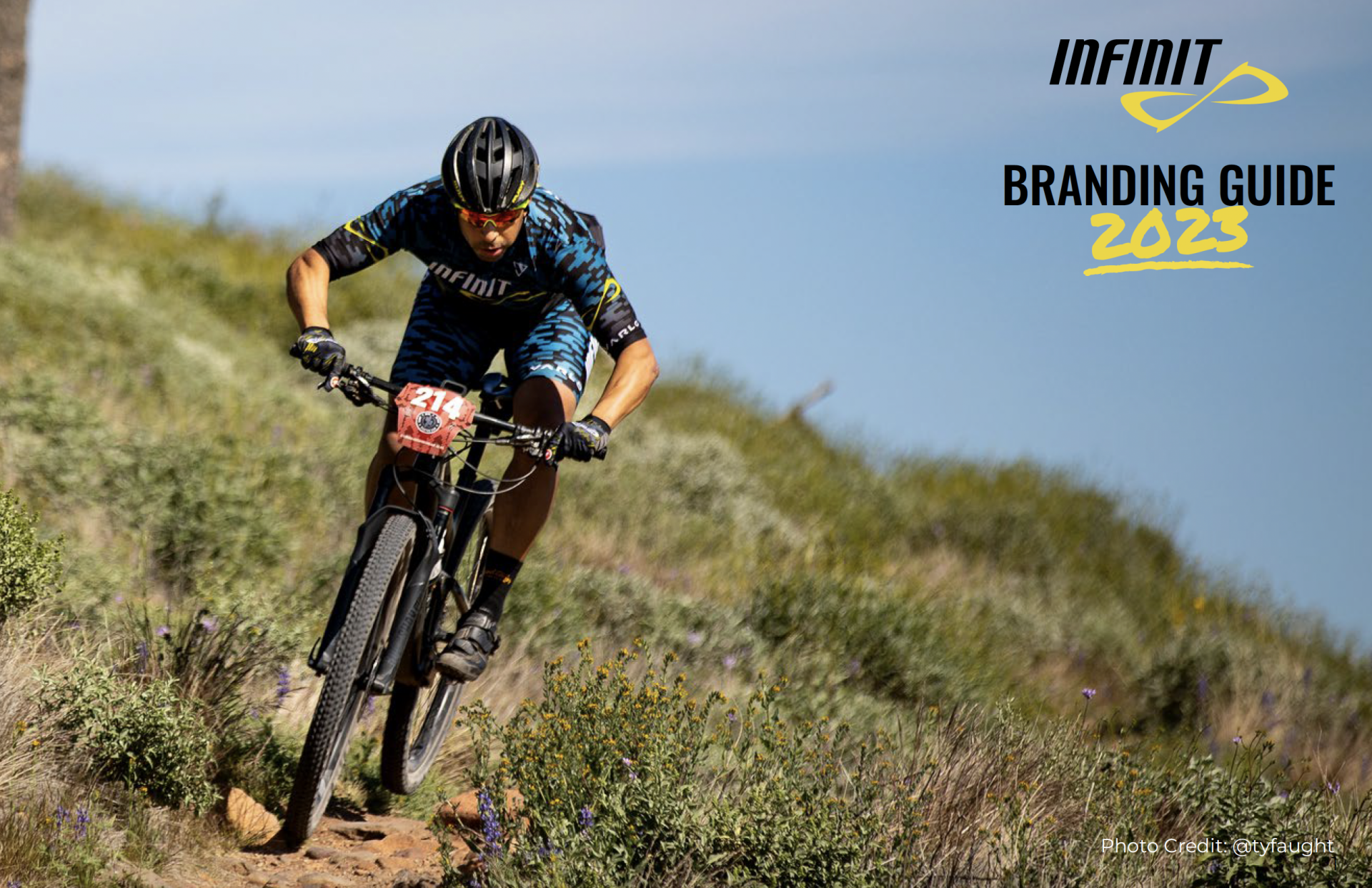 brand guidelines cover with mountain biker riding through desert on front